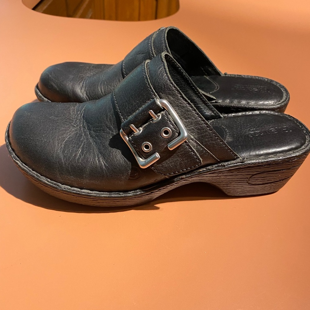Black Born clogs.